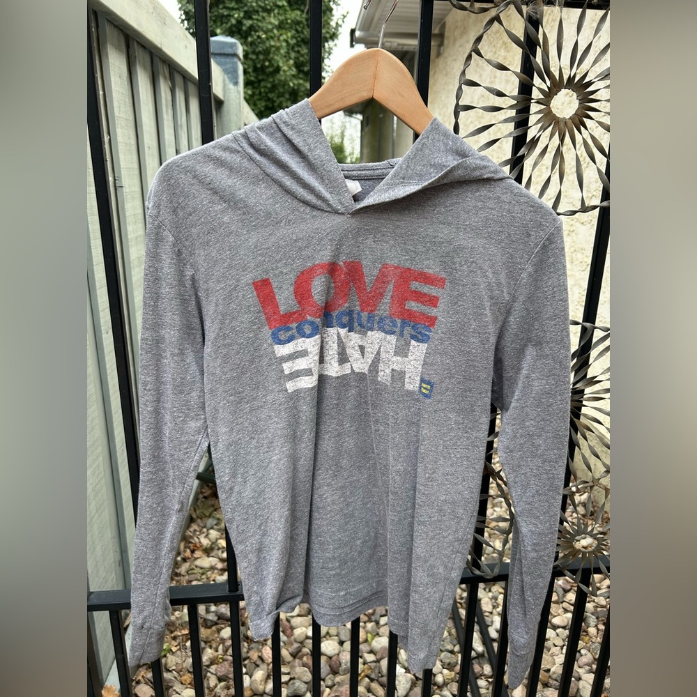 Gray “Love Conquers Hate” Hoodie